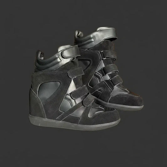 Kitty Suede Wedge Sneakers featuring a stylish black design with adjustable straps and a wedge heel.